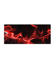 Mouse pad featuring red and black abstract design, 28x12 inches, with fiery red streaks against a dark background for a bold, energetic look.