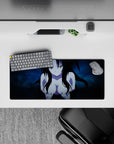 Anime mouse pad 28x12 inches featuring a mysterious character with flowing black hair and a cool blue background.