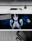 Anime desk pad featuring a mysterious character with black hair and blue background, sized 36x16 inches.