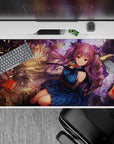 Dreamy chaos desk pad 40x20 inches in warm gold light, deep blue dress accents, magical anime aesthetic.
