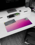 Geometric polygon mouse pad, 28x12 inches, showcasing a colorful blend of triangles in pink, purple, and peach, perfect for modern desks.