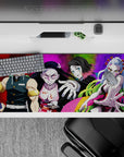 Anime desk pad 36x16 inches featuring Demon Slayer's Tengen Uzui, Nezuko, Gyutaro, and Daki with vibrant backgrounds.