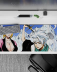 Anime desk pad 36x16 inches featuring Bleach captains Rangiku and Tōshirō, with icy blues and fiery reds.