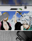 Desk pad 40x20 inches featuring Bleach's captains Rangiku and Tōshirō with ice mountains in stark whites and blues.