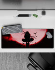 Intense 32x12 mouse pad combines shadowy ninja figure and crimson moon for a chilling yet stylish vibe