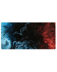 Mouse pad featuring a blue and orange abstract design, 32x16 inches, with orange bursts against a deep blue and black backdrop.