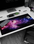 Deep space starfield scene desk pad 40x20 inches featuring glitter-like stars across nebula clouds.