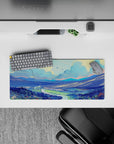 Serene 28x12 mouse pad featuring mountains, rivers, and pastel skies for a peaceful, nature-inspired atmosphere at your desk