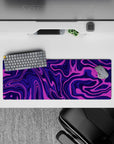 32x12 inches mouse pad with purple swirl abstract design, blending vibrant pinks and deep purples for a bold, dynamic, and creative aesthetic.