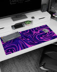 Artistic 36x16 inches mouse pad featuring purple swirl abstract design, with vibrant pinks and deep purples to infuse creativity into your workspace.