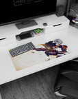 Anime girl mouse pad 28x12 inches showing a focused fighter with spiked hair, shoulder fins, and flying debris.