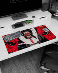 Fierce red-eyed anime schoolgirl with long black hair and floating petals on a 32x16 inches mouse pad.