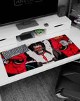 36x16 inches desk pad featuring a school-uniform anime girl with long black hair and sharp red eyes.