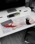 Red-haired, golden-eyed anime girl on pale gray sheets desk pad 36x16 inches, white camisole art.