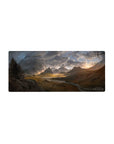 Mouse pad featuring majestic mountains, 28x12 inches, stormy skies, and a distant dragon for a powerful, fantasy-inspired design.