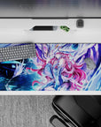 36x16 inches anime desk pad in electric blues and icy purples, dreamy nebula glow with star-spark highlights.