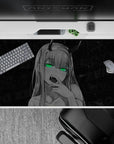 Mysterious 40x20 desk pad showcases Zero Two's piercing gaze and fanged smirk for bold fan appeal