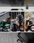 Anime mouse pad 40x20 inches featuring Tanjiro, Inosuke, and Zenitsu from Demon Slayer in a dynamic, sketch-style battle.