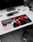 Modern 32x16 inches mouse pad with Itachi Uchiha, featuring the calm strength of his character surrounded by red petals.
