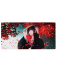 Mouse pad featuring Itachi Uchiha, 32x16 inches, with red petals around him, capturing the serene yet powerful essence of his character.