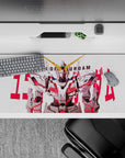 White and gray mecha desk pad 36x16 inches with neon red psycho-frame lines and a gold V-fin.