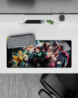 Demon Slayer mouse pad 28x12 inches featuring Tanjiro, Nezuko, Zenitsu, Inosuke, and Giyu in vibrant battle scene.