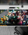 Anime mouse pad 40x20 inches featuring Demon Slayer's Tanjiro, Nezuko, Zenitsu, Inosuke, and Giyu in action.