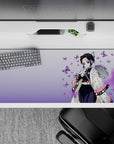 36x16 inches desk pad with Shinobu Kocho surrounded by purple butterflies and soft colors, capturing the grace of the Butterfly Hashira.