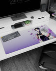 Artistic 36x16 inches desk pad featuring Shinobu Kocho from Demon Slayer, with delicate butterflies and soothing hues for a graceful workspace.