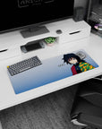 Giyu Tomioka anime mouse pad 32x12 inches, featuring his iconic stare and patterned haori in greens, golds, and oranges.