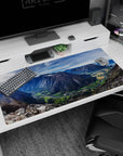Large 40x20 inches mouse pad featuring majestic mountain valleys, with cliffs, rivers, and farmlands for a serene, dramatic desk aesthetic.
