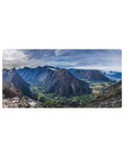 Mouse pad featuring mountain valley, 32x16 inches, with winding rivers, towering cliffs, and lush farmlands for a serene, natural look.