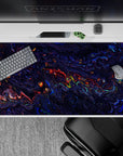 40x20 inches mouse pad showcasing a vibrant liquid abstract design with deep blues, purples, and fiery reds, adding bold artistic energy to your desk.