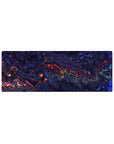 Compact 32x12 inches mouse pad with a liquid abstract design, featuring deep blues, purples, and fiery reds for a dynamic, artistic atmosphere.