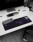 Artistic 32x12 inches mouse pad featuring purple marble design, with vibrant purple veins and a deep black backdrop for a striking effect.
