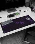 Artistic 36x16 inches mouse pad featuring purple marble design, with cosmic purple veins and a black backdrop for an elegant, otherworldly effect.