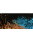 Celestial 36x16 desk pad featuring deep blues and fiery copper tones, creating a cosmic flow perfect for a fluid, otherworldly workspace