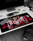 RX-0 Unicorn Gundam staring forward on an anime desk pad 40x20 inches, bold UNICORN text and red slashes.