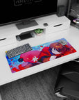 32x12 inches desk mat featuring a sleepy brown-haired anime girl curled up in a red hoodie scene.