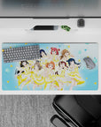 Bright sky-blue anime idol mouse pad 32x16 inches, cheerful lemon accents, winks, peace signs, confetti.