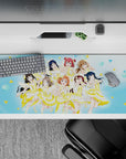 Bright sky-blue 36x16 inches anime desk pad, lemon-white ribbons and bubbly idol vibe for gaming or work.