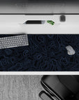 Striking 36x16 desk pad highlights intricate blue lines with deep black contrast for a sense of refined motion