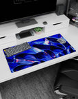 Modern 32x16 inches mouse pad featuring electric blue, metallic wave design, with purple and pink highlights for a stylish, futuristic vibe.