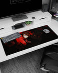 Artistic 36x16 inches desk pad featuring Itachi Uchiha in his Akatsuki robe with his Sharingan, blending power and mystery.
