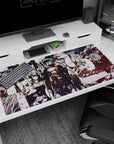 Steel-armored Goblin Slayer with visor down and fur collar on anime desk pad, 40x20 inches.
