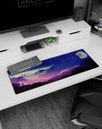 Serene 32x12 mouse pad featuring a starry night over mountains in deep purple and blue hues for a calming cosmic workspace design