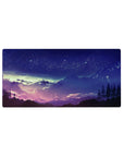 Starry night 32x16 mouse pad with deep purple and blue hues and dreamy mountains for a serene, cosmic workspace vibe