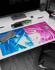 Troublemaker anime girl staring back on desk pad 40x20 inches, split-color face and sharp eye glint.