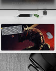 32x16 inches mouse pad with Guts in his Berserker Armor, showcasing fierce brush strokes and a glowing eye, ideal for channeling the power and spirit of the Black Swordsman.