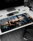 Anime catgirl lounging on sofa by loft windows, pink headphones and fishnets, desk pad 40x20 inches.